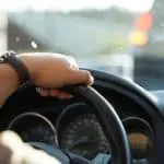 View over the shoulder a person driving