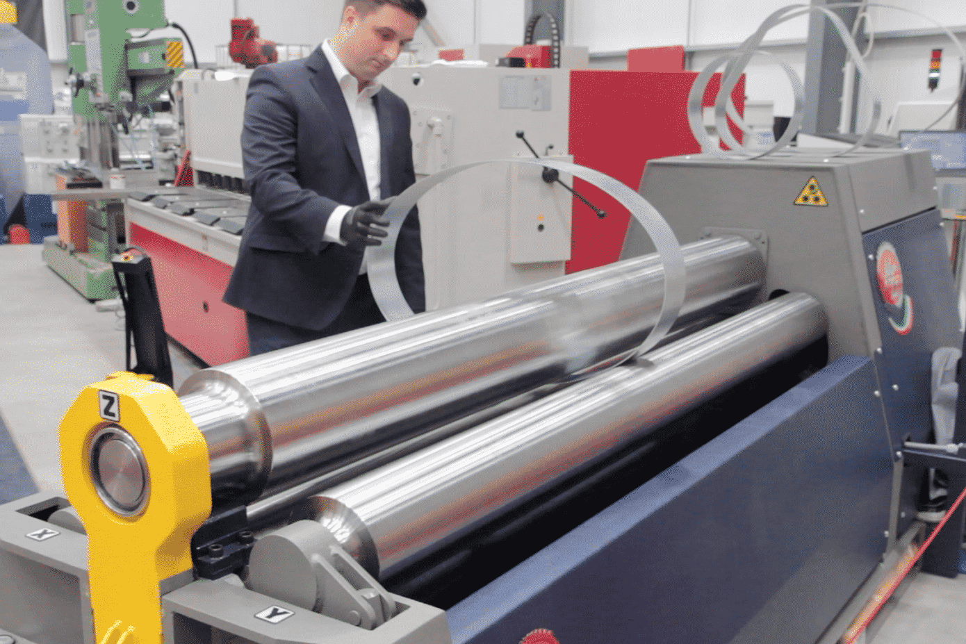 Bruce Bushnell demonstrating the The advantages of a CNC MG Bending Rolls