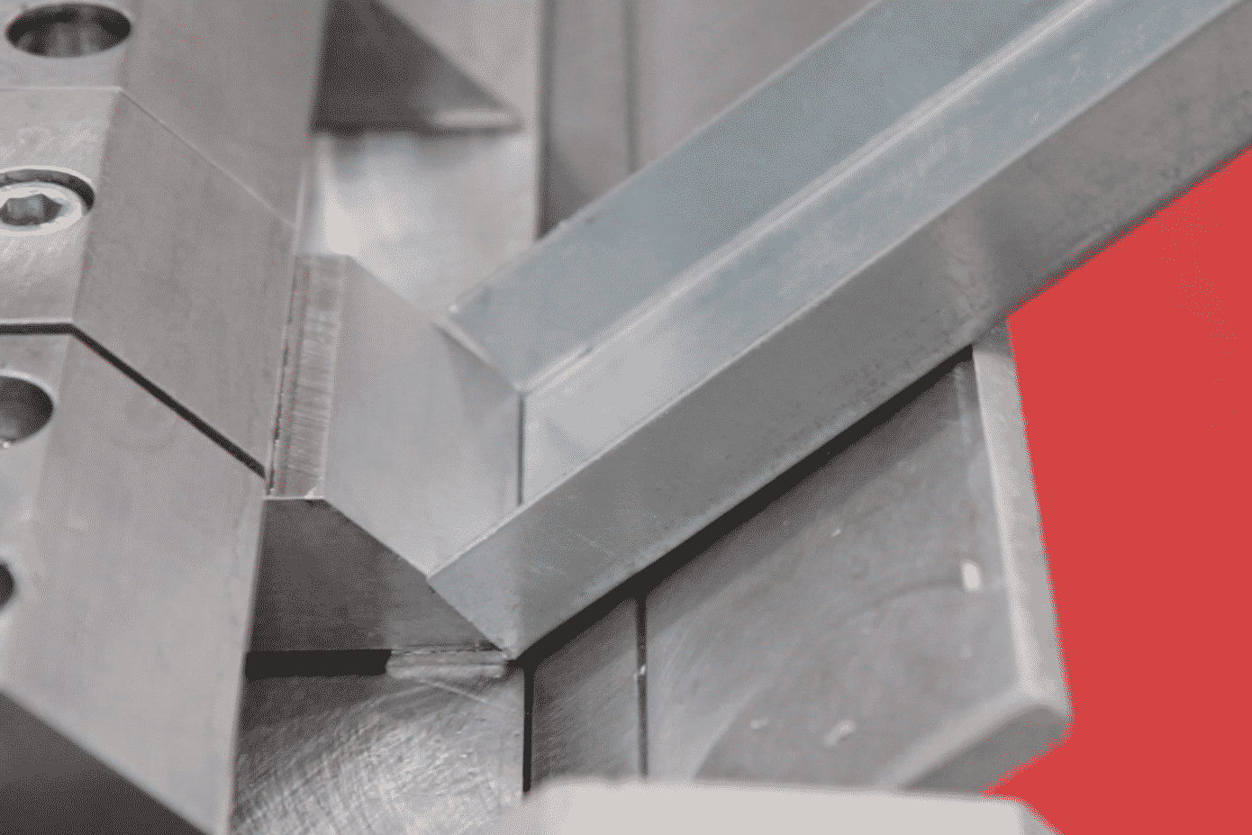 Image of a box section being folded on a Morgan Rushworth Box and Pan Folder