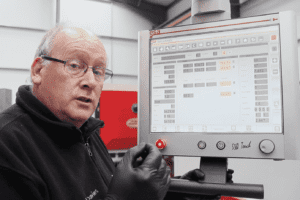 Operator adjusting Y1 and Y2 on Press Brake ESA control