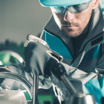 Image of man working on a machine