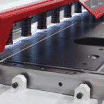 Optional-Extras-to-Consider-with-your-Guillotine Close up detail of the optional swing up front guard on a guillotine