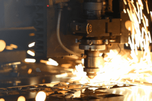 Detail of the plasma cutting head cutting metal