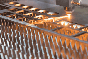 Close up of Raytool Cutting Head cutting sheet metal