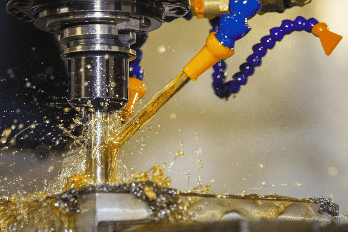 Working-Safely-with-Coolant-Fluids Coolant following over a drill bit on a Pillar Drill