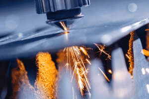 Close up detail of plasma cutting sheet metal