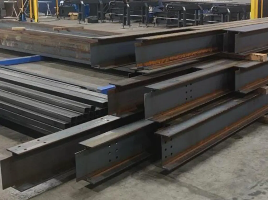 Stacks of freshly laser cut Steel Beams