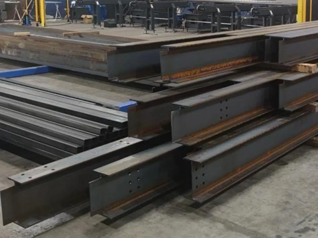 Stacks of freshly laser cut Steel Beams