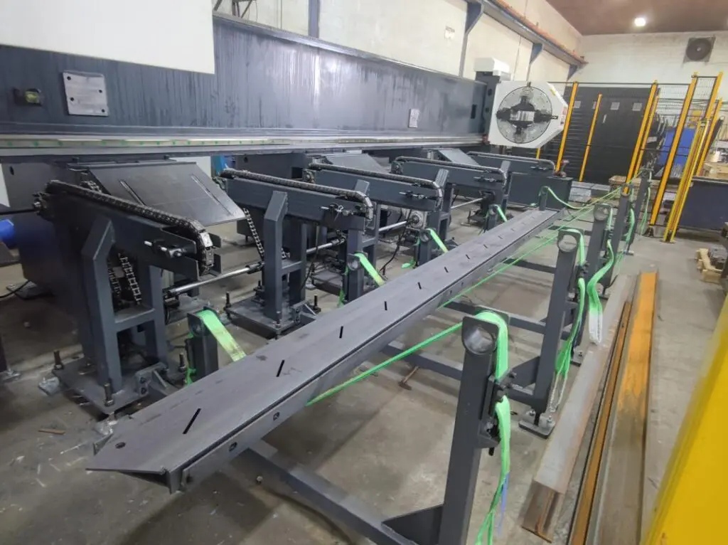 A bundle loading system for a Tube and Section Laser with a bundle of material ready for feeding through.