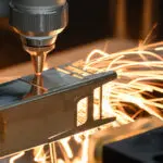 Close up of a Tube Laser Cutting out parts of a piece of square box section