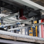 - Operator at the control panel of a Morgan Rushworth CNC fibre laser
