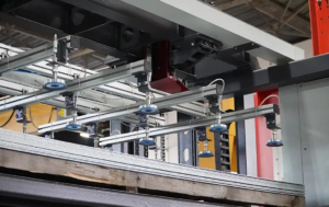 - Operator at the control panel of a Morgan Rushworth CNC fibre laser