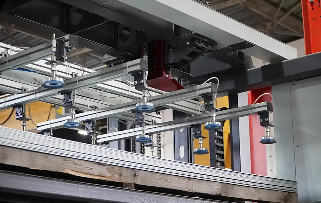 - Operator at the control panel of a Morgan Rushworth CNC fibre laser