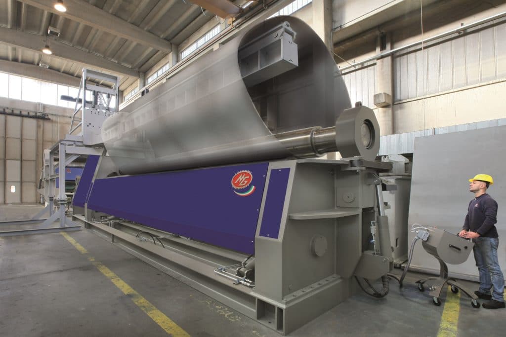 Large oval sheet metal being rolled on a MG CNC Bending Rolls