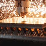 Image of Laser Head cutting a sheet metal plate